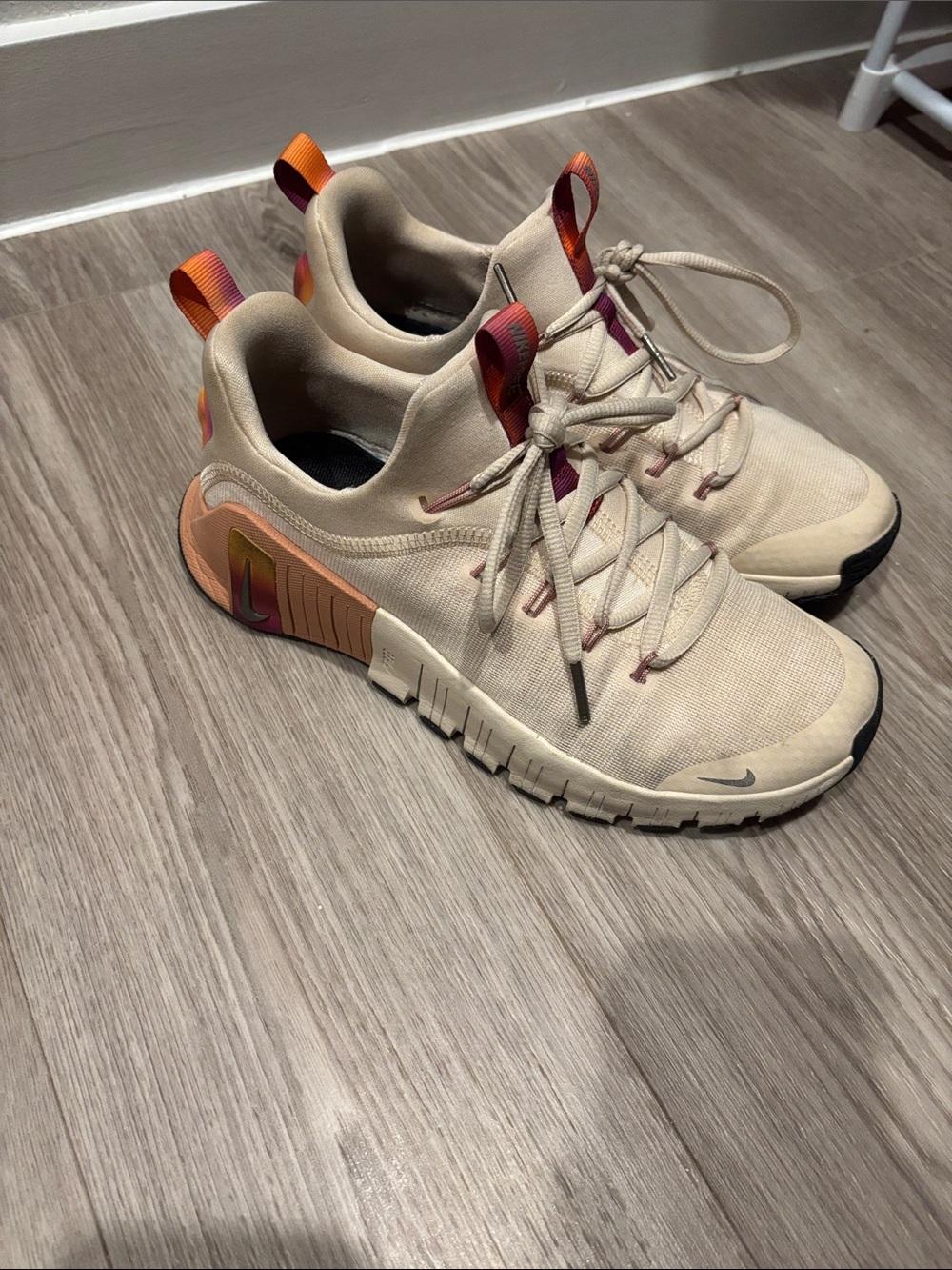 Nike Beige Sneakers with Orange and Purple Accents
